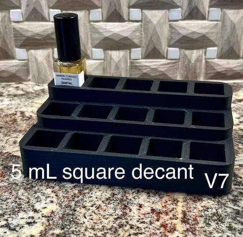 Holds 15 5mL square bottles